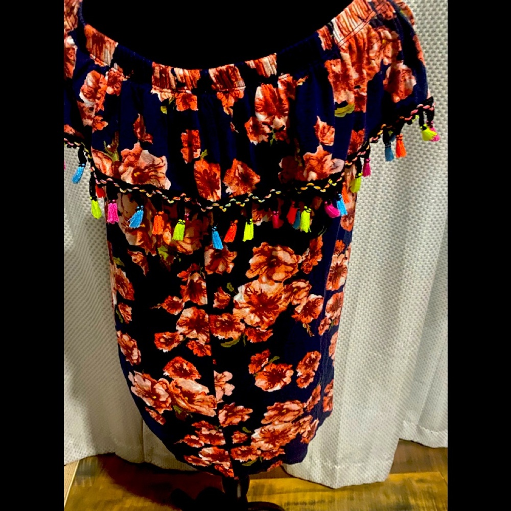 Festive, floral blouse with colorful tassels. Size small/medium